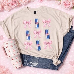 Cream T-Shirt with Pink Bows and Red Bull Design